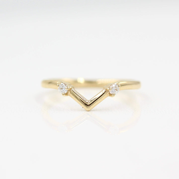 The Double Diamond V-Band in yellow gold against a white background