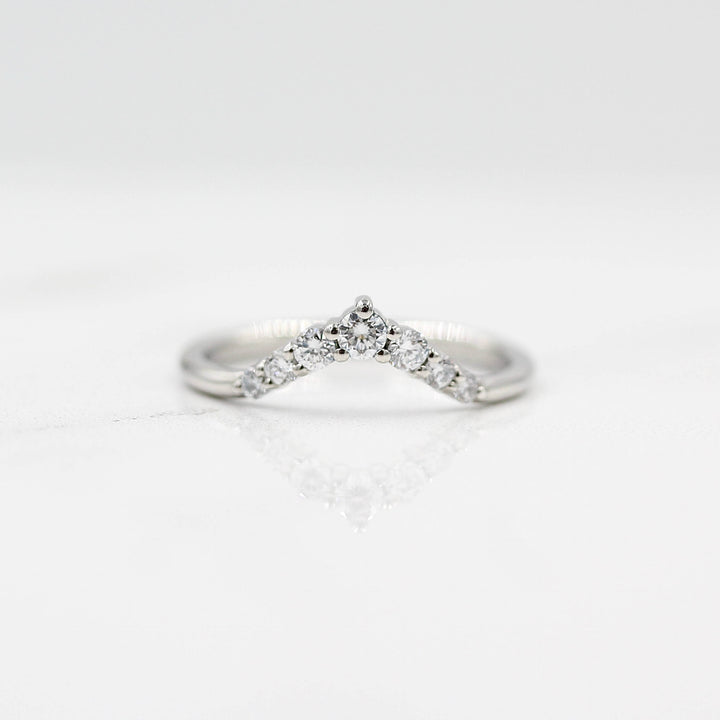 The Tiara Wedding Band in platinum against a white background
