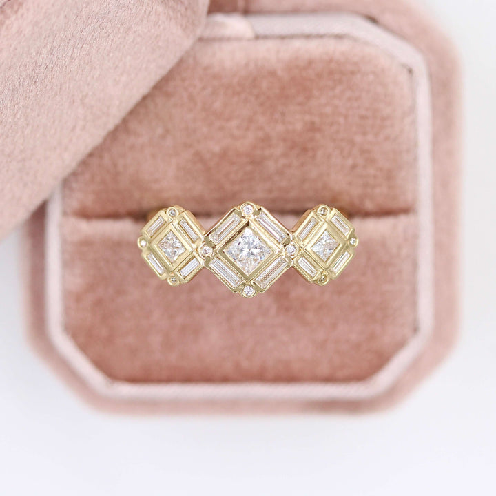 The Darby Ring in yellow gold in a pink velvet ring box