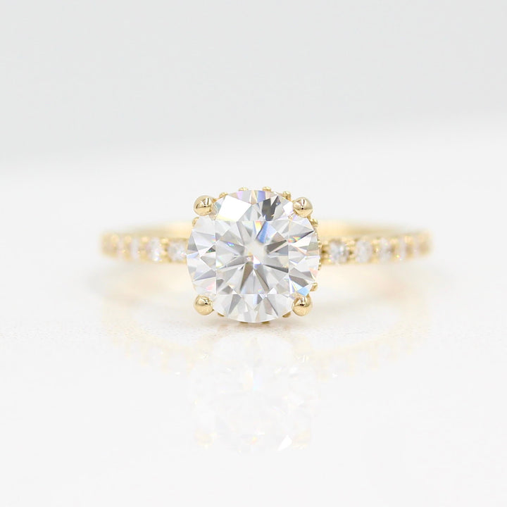 The Athena Hidden Halo Ring (Round) in Yellow Gold against a white background