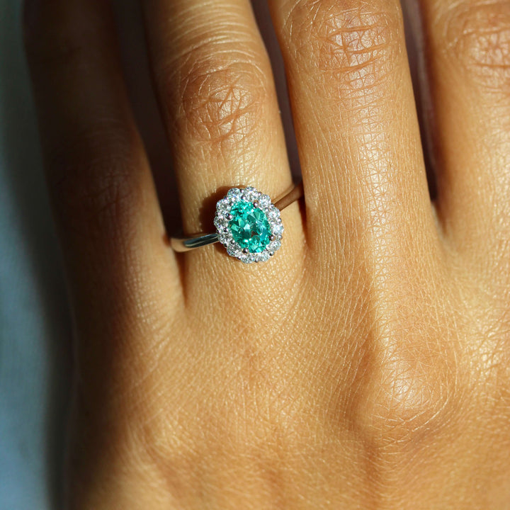 The Ava Ring with Minty Green Chrysoberyl in white gold modeled on a hand