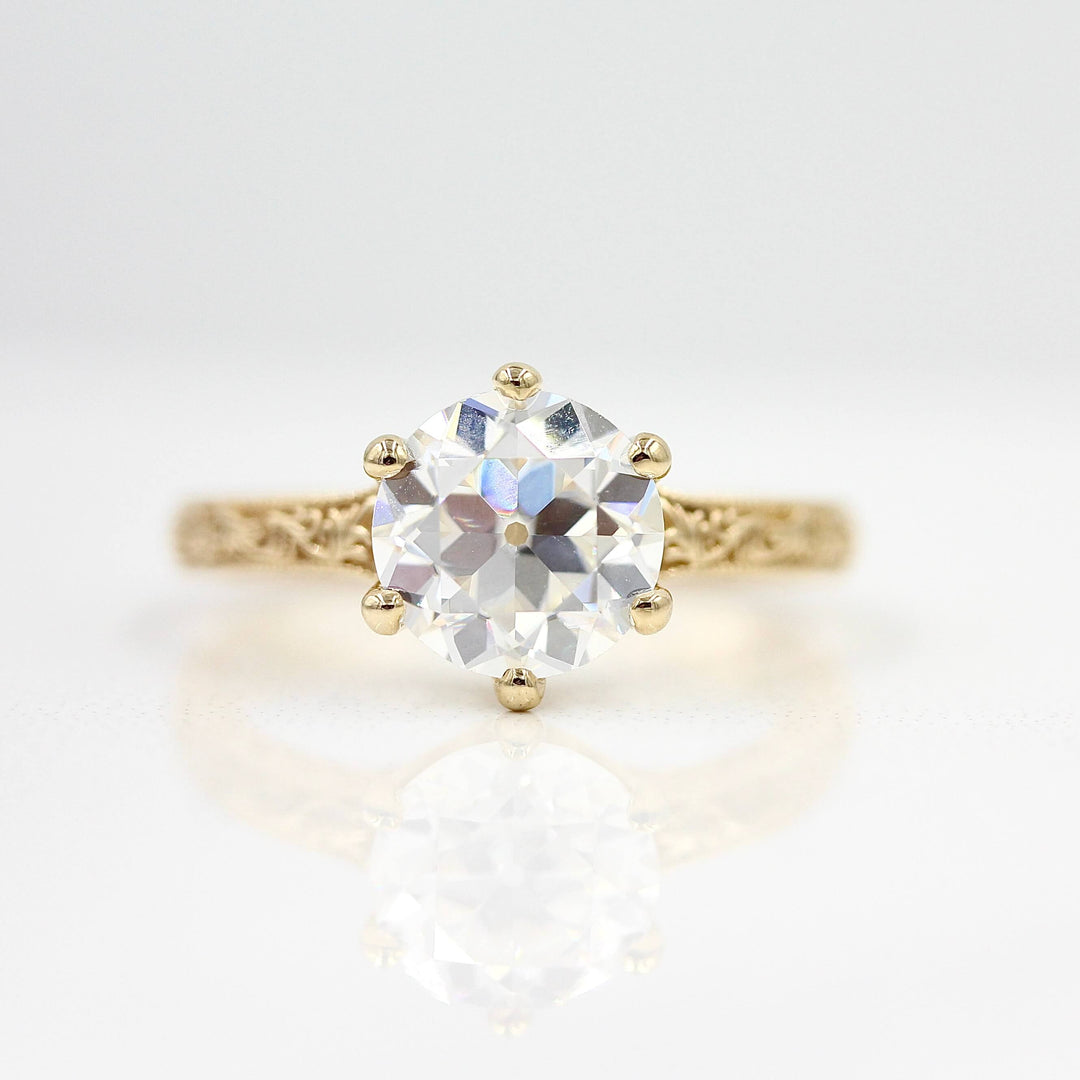 The Kathleen ring in yellow gold against a white background