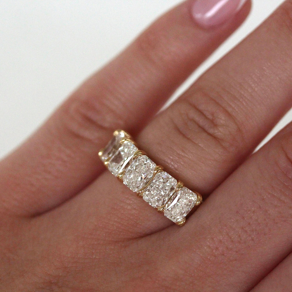 The Keeley Wedding Band in Yellow Gold modeled
