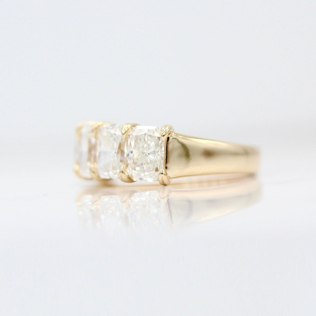 The Keeley Wedding Band in Yellow Gold against a white background