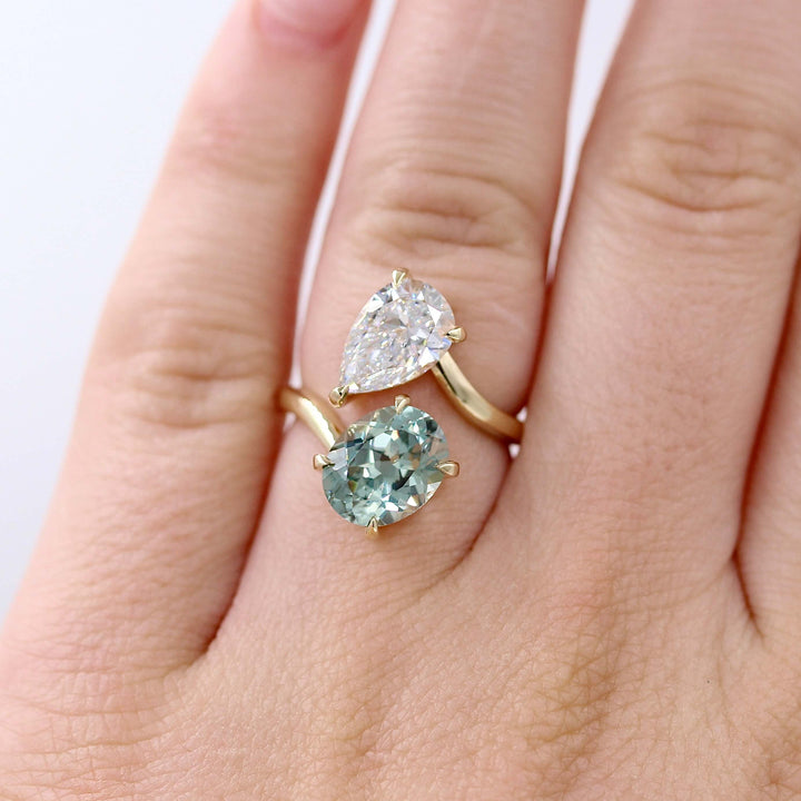 Engagement Ring 14k Yellow Gold Toi Et Moi Diamond and Sage Green Sapphire Bypass Ring in Yellow Gold modeled