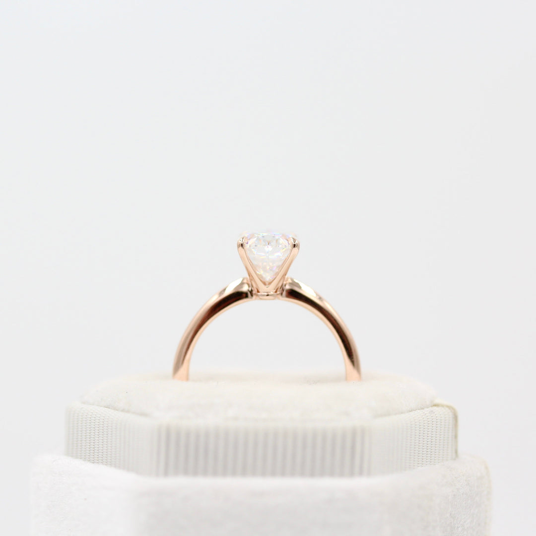 The Margot Ring (Oval) in Rose Gold in a white velvet ring box