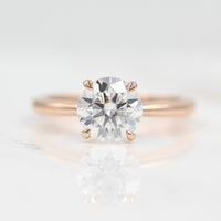 The Margot ring (round) in rose gold against a white background