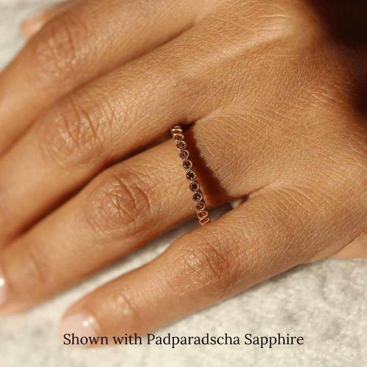 The January Florence Birthstone Ring with Padparadscha Sapphire in Yellow Gold modeled