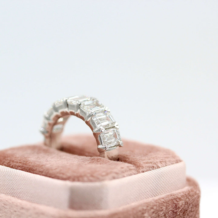 The Rebecca wedding band in white gold in a pink velvet ring box