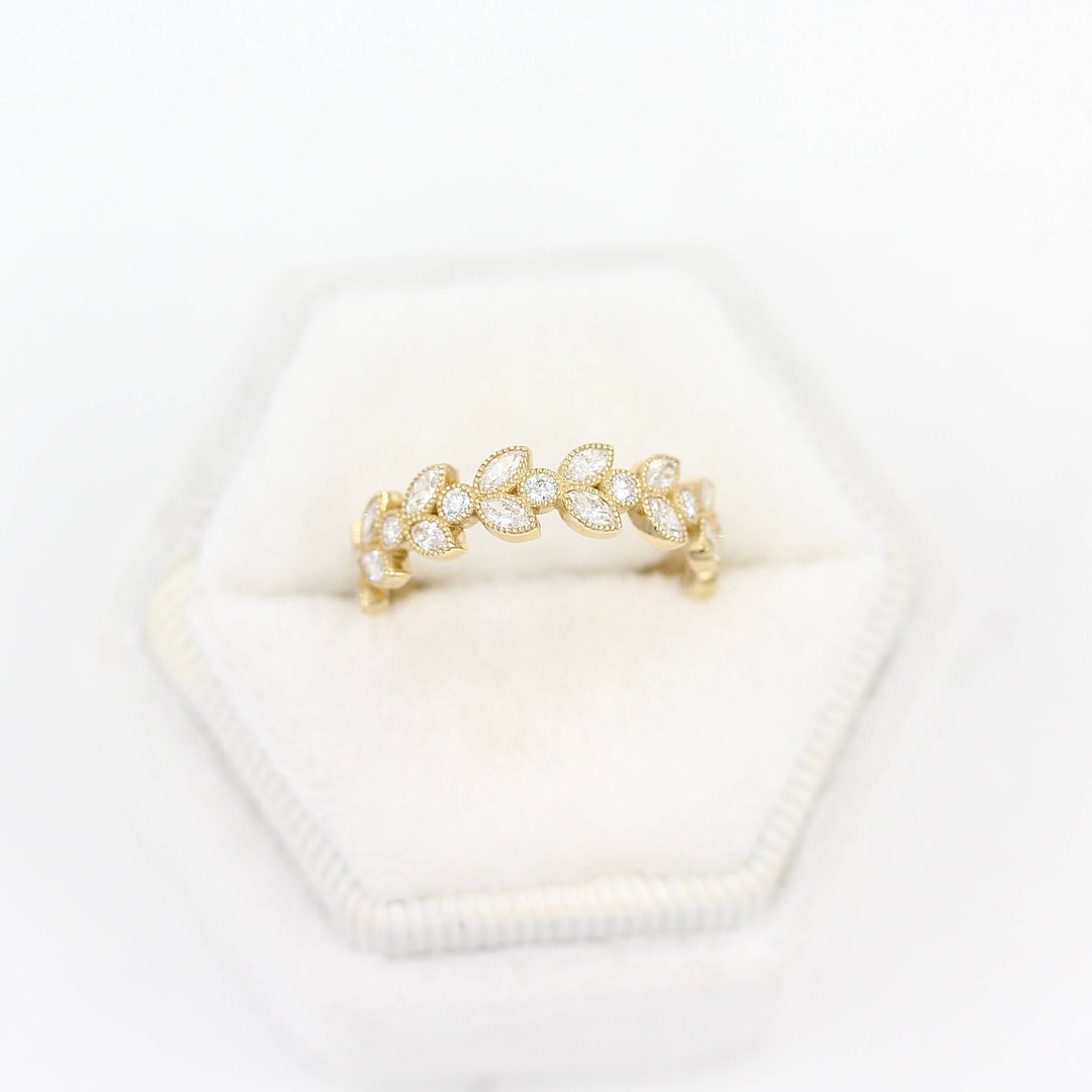 The Salimata Ring in Yellow Gold in a white velvet ring box