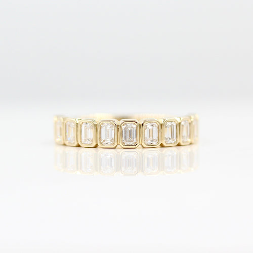 The Sammy Wedding Band in Yellow Gold against a white background