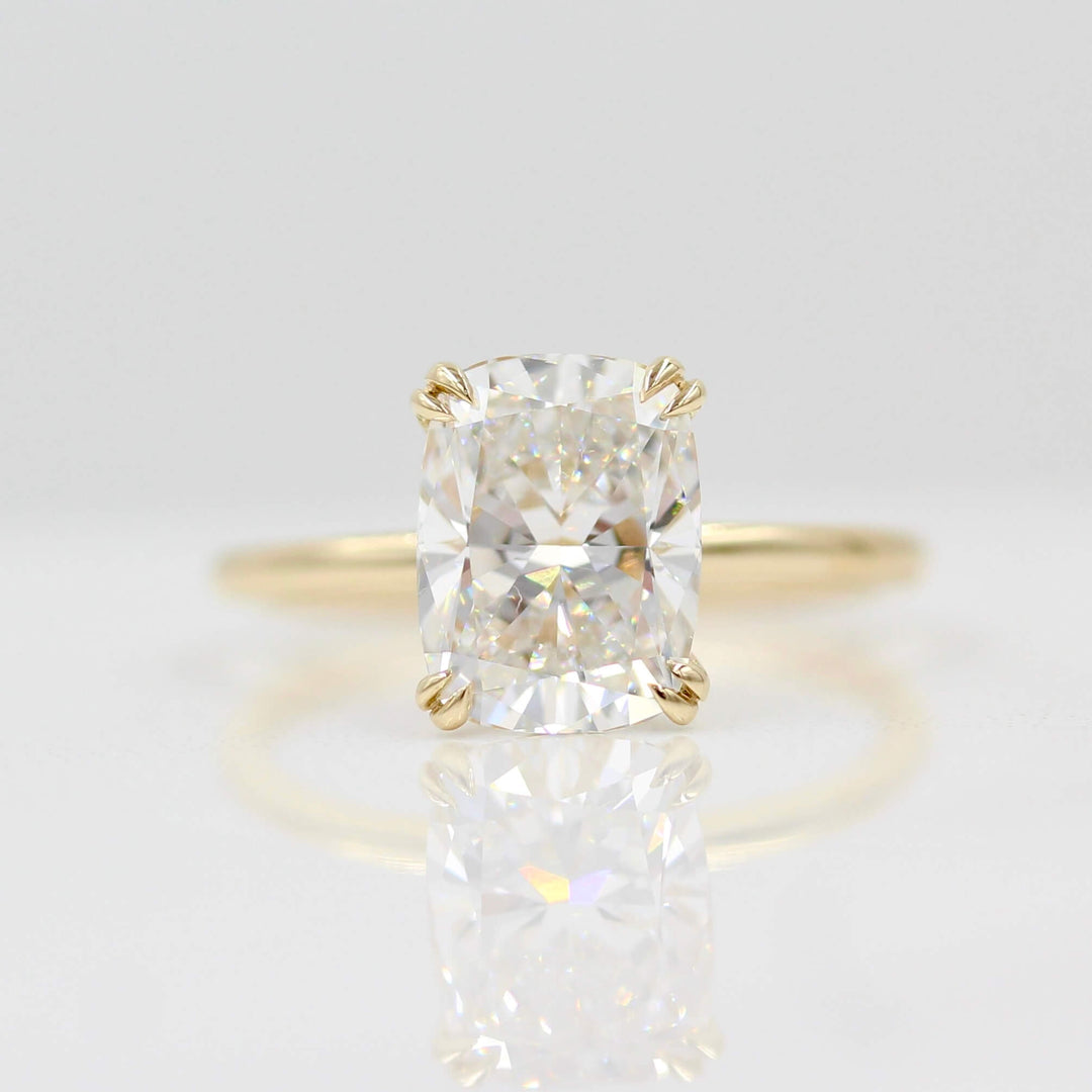 The Serena Ring (Elongated Cushion) in Yellow Gold with 3.06ct Lab-Grown Diamond against a white background