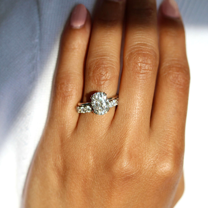 The Serena Ring (Oval) in White Gold stacked with the Open Lexington wedding bands modeled on a hand