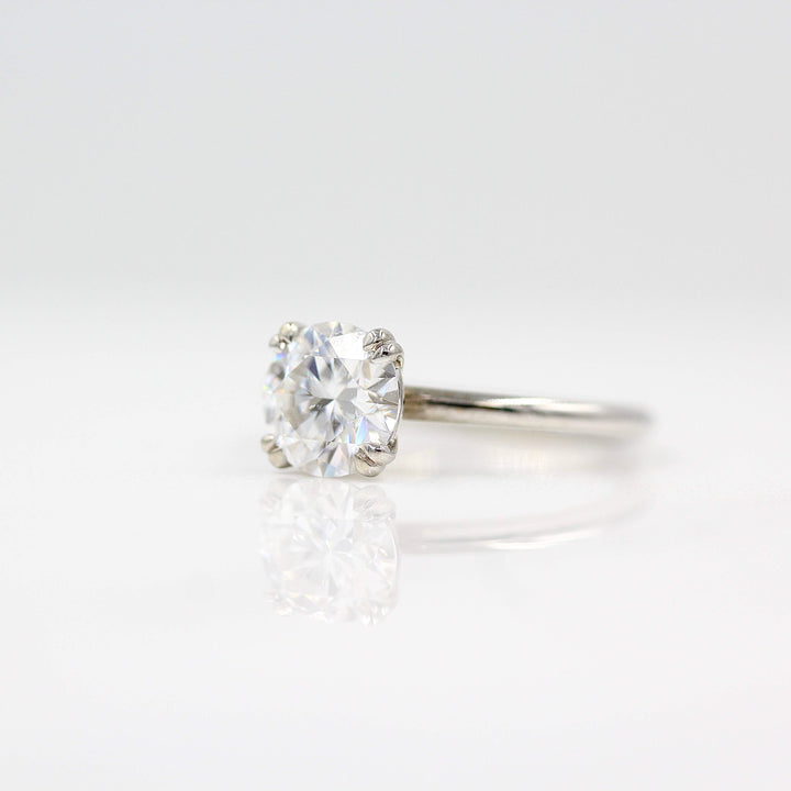 The Serena ring round in white gold against a white background