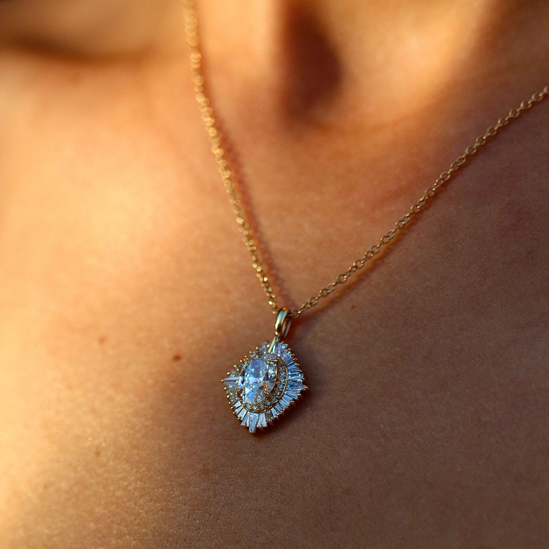 The Sojourner Pendant in Yellow Gold and Lab Grown Diamond modeled on a neck