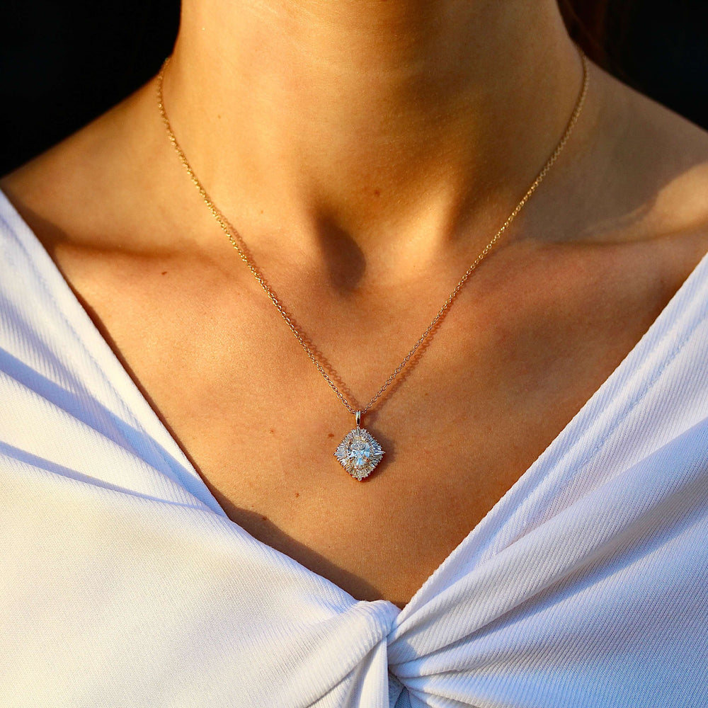 The Sojourner Pendant in Yellow Gold and Lab Grown Diamond modeled on a neck