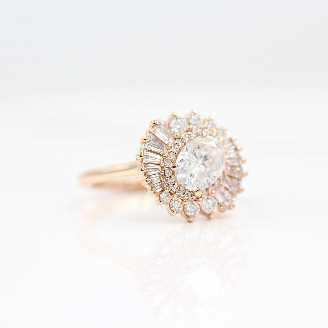 The Soleil Ring in Rose Gold and Moissanite against a white background