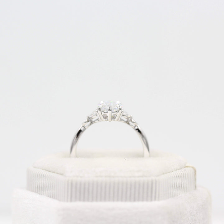 The Sophia Ring (Marquise) in white gold in a white velvet ring box