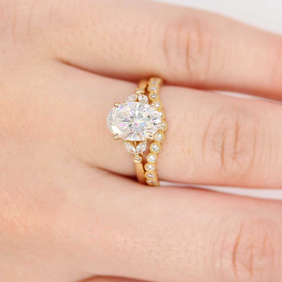Ready to Ship Ring 14k Yellow Gold The Sophia Ring (Oval) in Yellow Gold with 2ct Moissanite stacked with the Florence Contour Band in Yellow Gold modeled