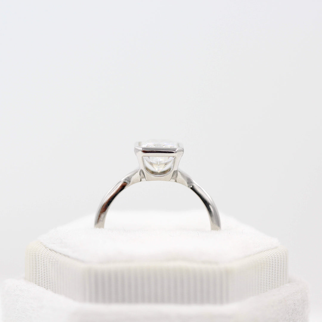 The Stevie Ring (Radiant) in White Gold with 2ct Moissanite in a white velvet ring box