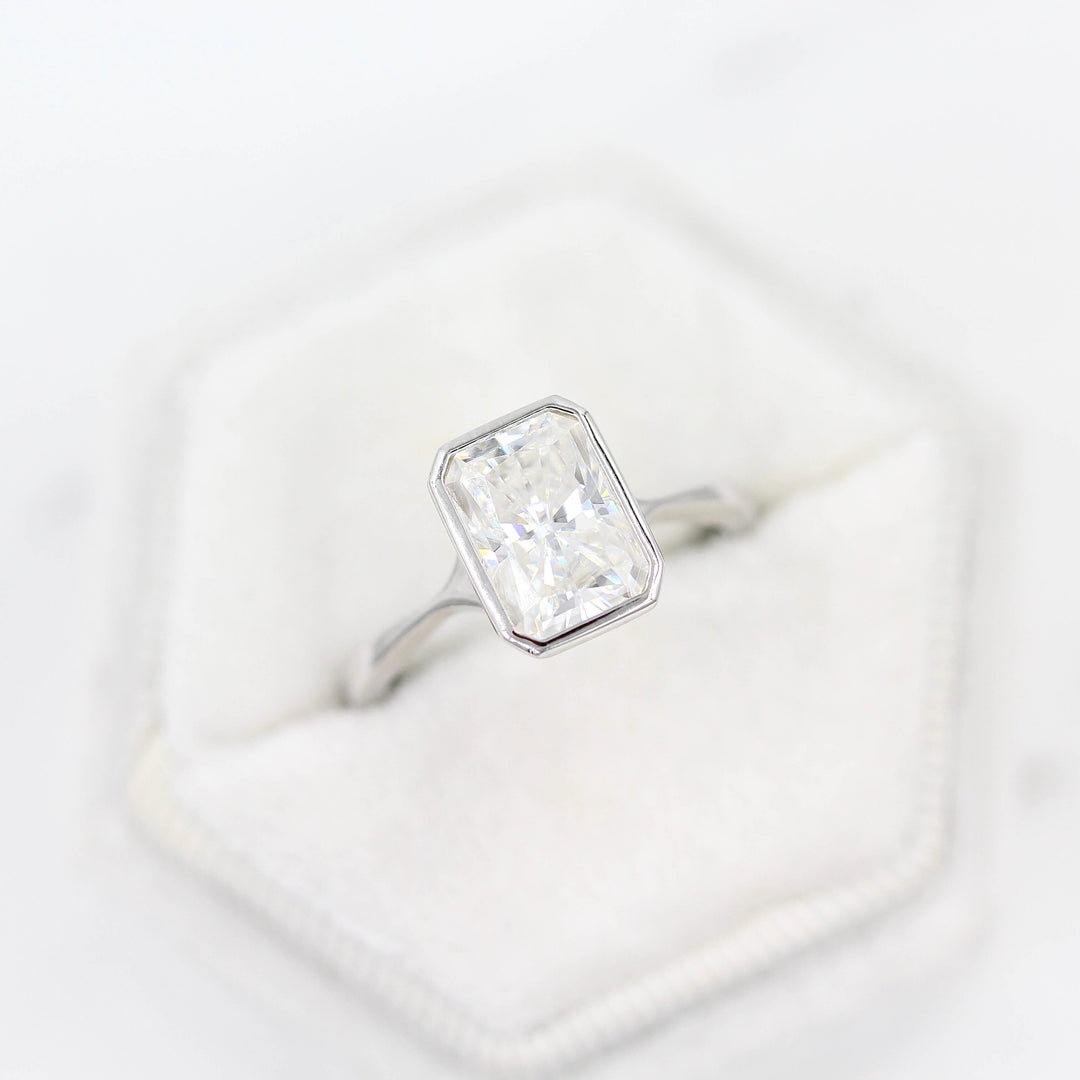 The Stevie Ring (Radiant) in White Gold with 2ct Moissanite in a white velvet ring box