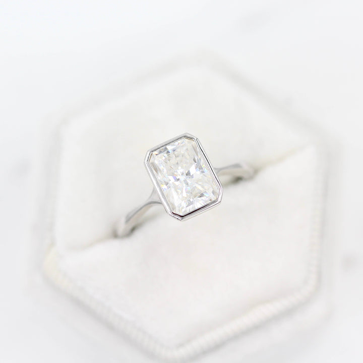 The Stevie Ring (Radiant) in White Gold with 2ct Moissanite in a white velvet ring box