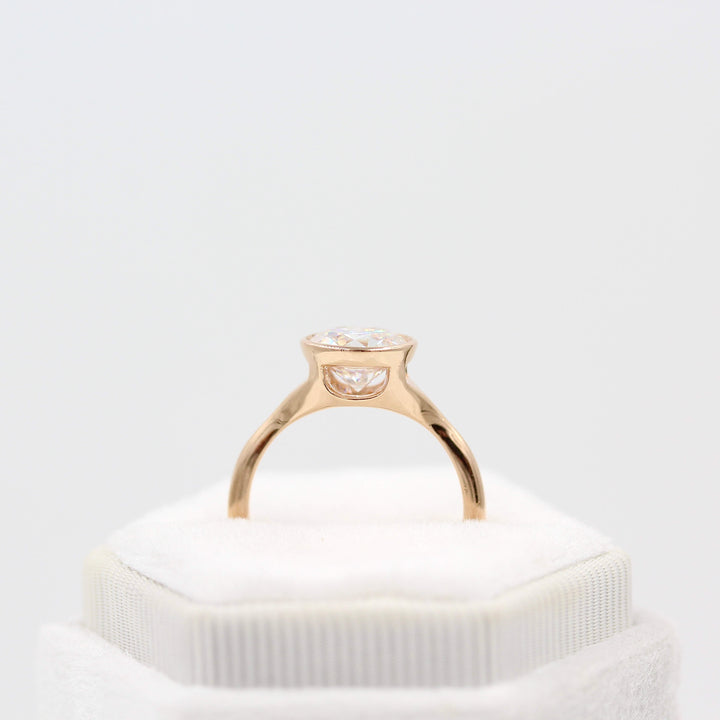 The Stevie Ring (Round) in Rose Gold with 2ct Moissanite in a white velvet ring box