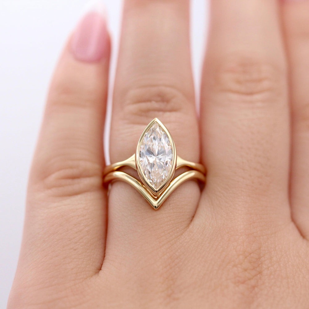 The Stevie Ring (Marquise) in Yellow Gold with a 2ct Lab-Grown Diamond modeled