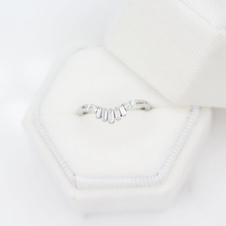 The Sunburst Wedding Band in White Gold in a white velvet ring box