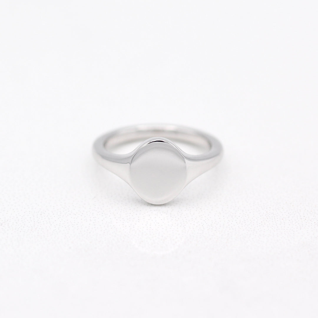 Sterling Silver North- South Oval Signet Ring on a White Background