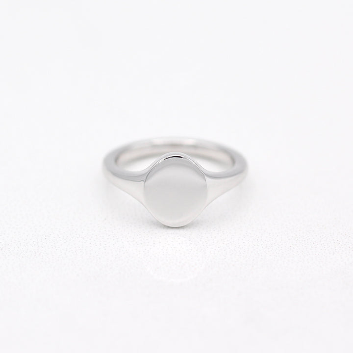 Sterling Silver North- South Oval Signet Ring on a White Background