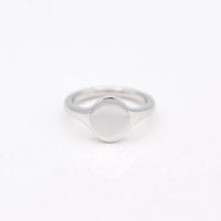 Sterling Silver North- South Oval Signet Ring on a White Background