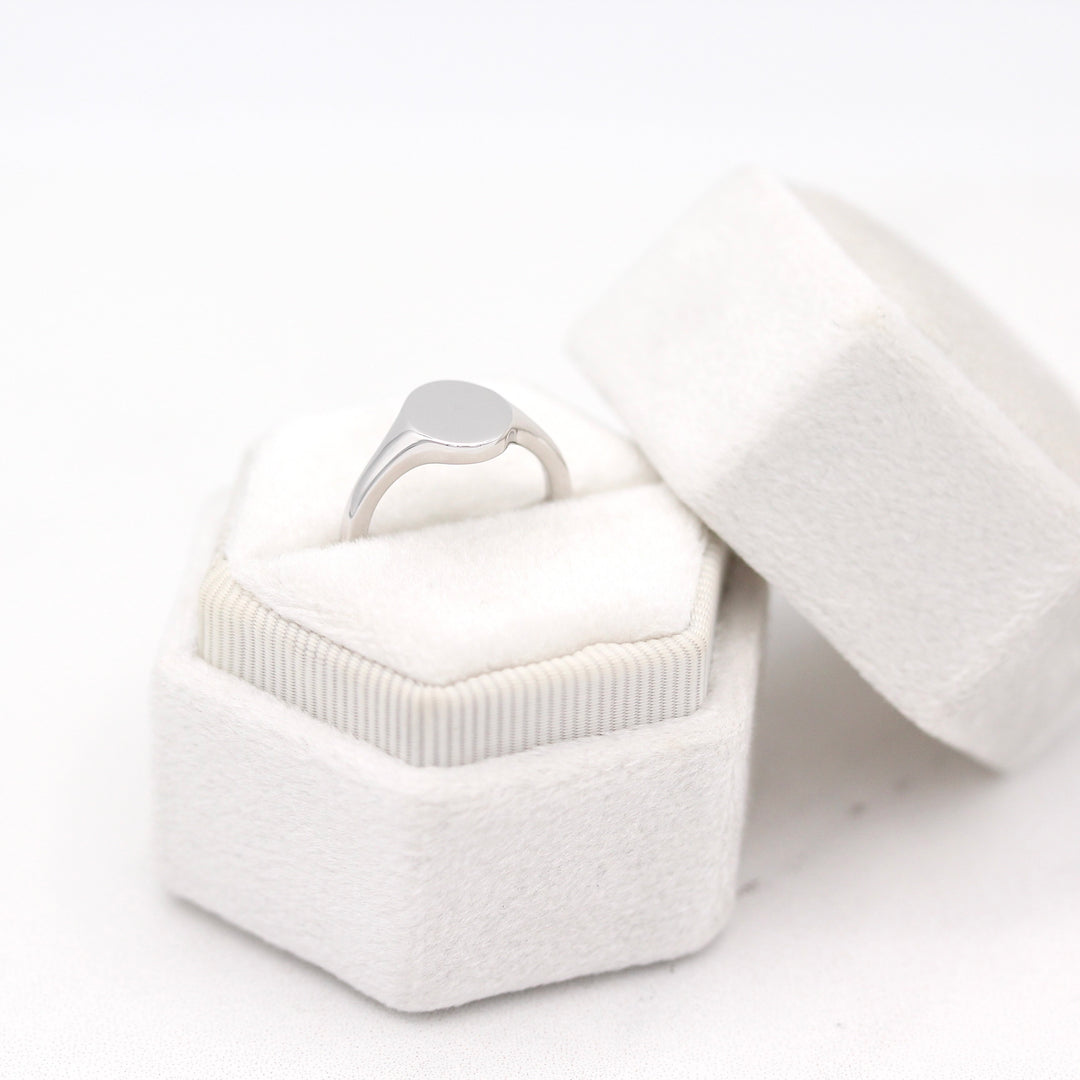 The Katherine North-South Oval Pinky Ring in a White Velvet Ring Box