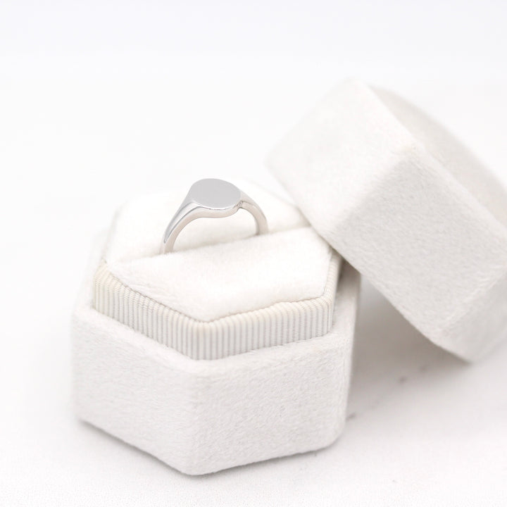The Katherine North-South Oval Pinky Ring in a White Velvet Ring Box