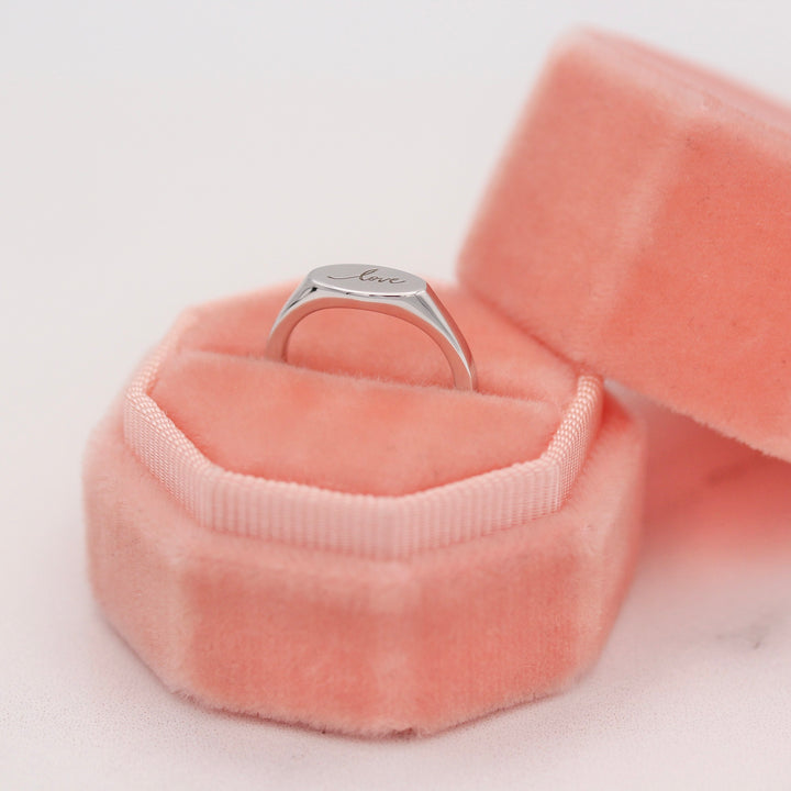 Sterling Silver "Love" Engraved Signet Oval Ring in a Coral Velvet Ring Box