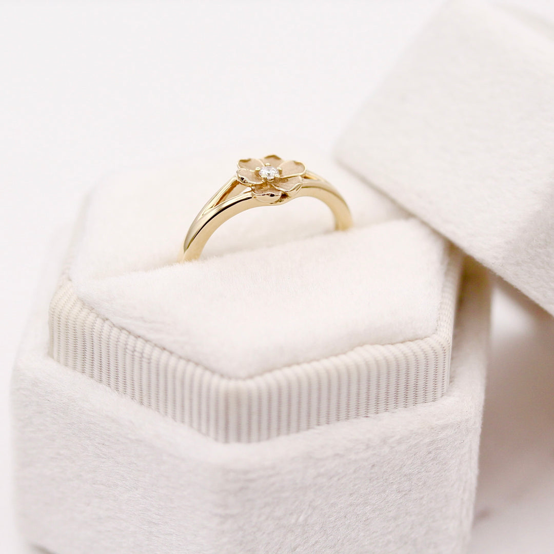 Profile view of the Yellow Gold Poppy Pinky Ring in a White Velvet Ring Box