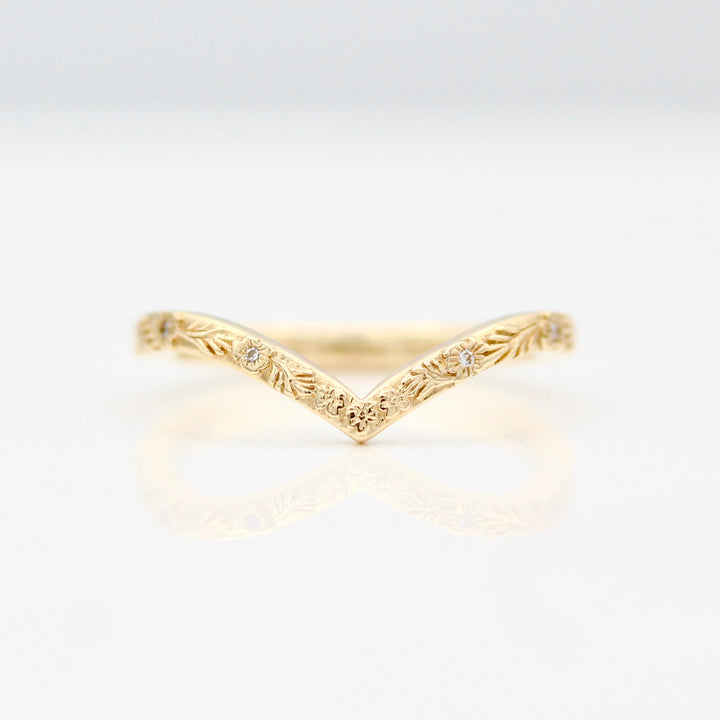 Engraved Floral V shaped Wedding Band with inset Round Lab-Grown Diamonds in Yellow gold.