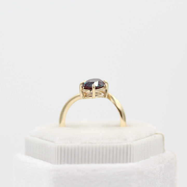 Toi et Moi Diamond and Alexandrite Bypass Ring in yellow gold in a white velvet ring box