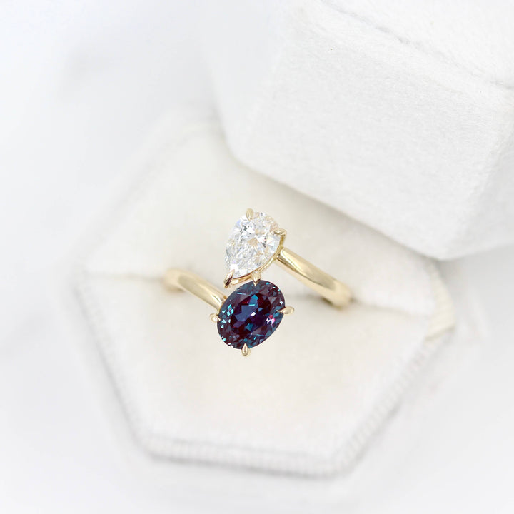 Toi et Moi Diamond and Alexandrite Bypass Ring in yellow gold in a white velvet ring box