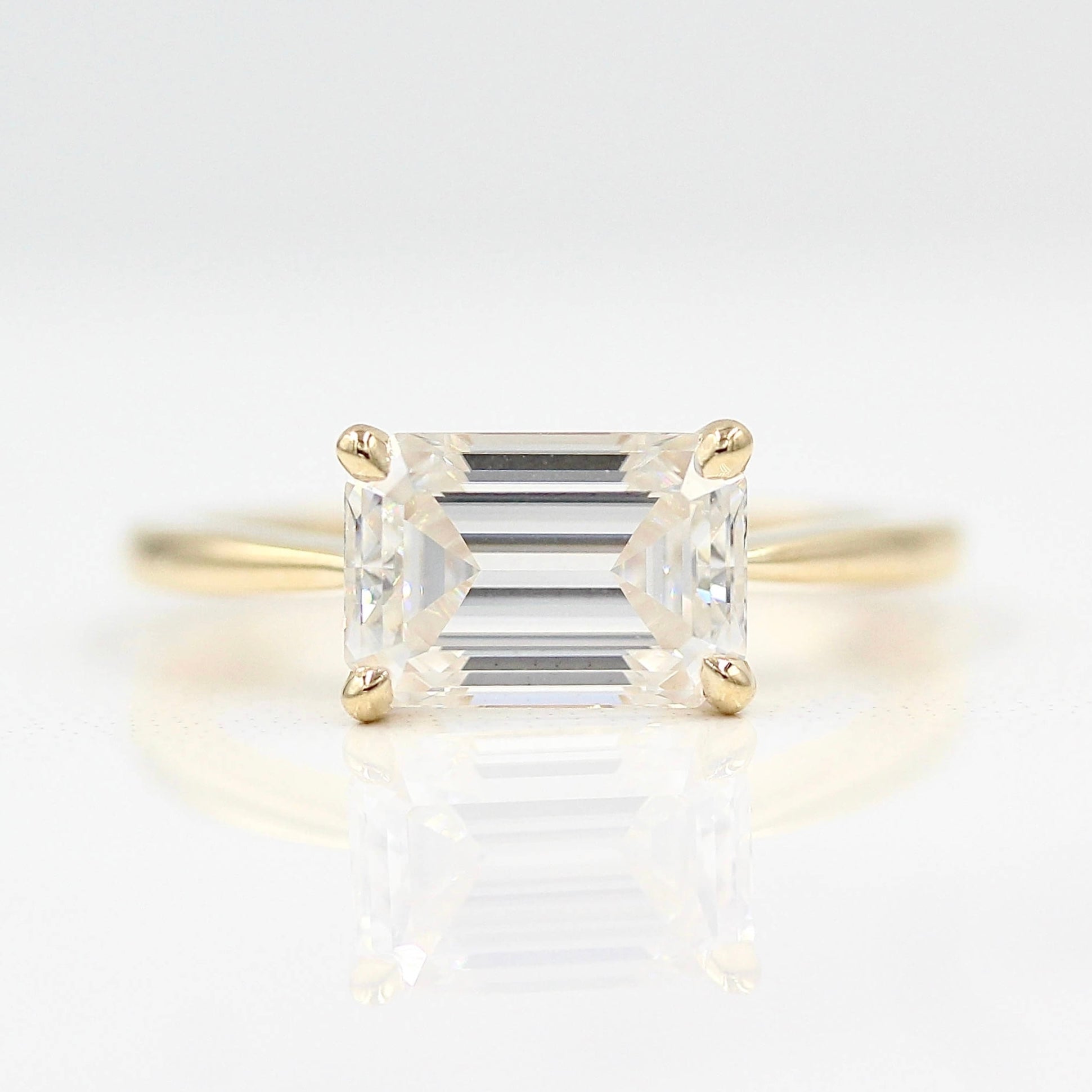 Horizontal emerald sales diamond ring