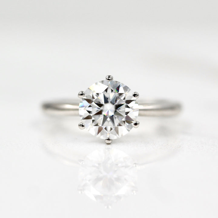 The Audrey Ring in White Gold and 2ct Moissanite against a white background