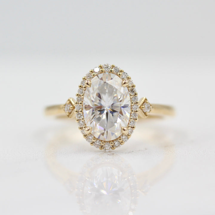 Casey Ring (Oval) in Yellow Gold with 2ct Moissanite on white background