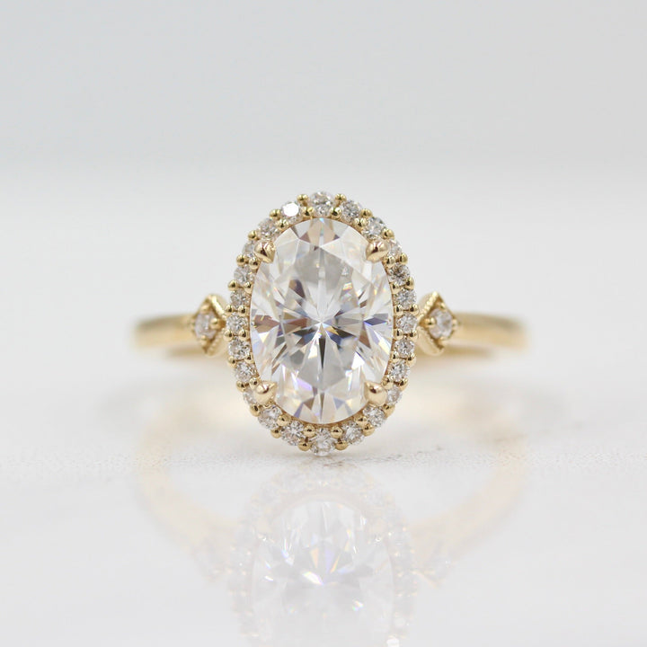 Casey Ring (Oval) in Yellow Gold with 2ct Moissanite on white background