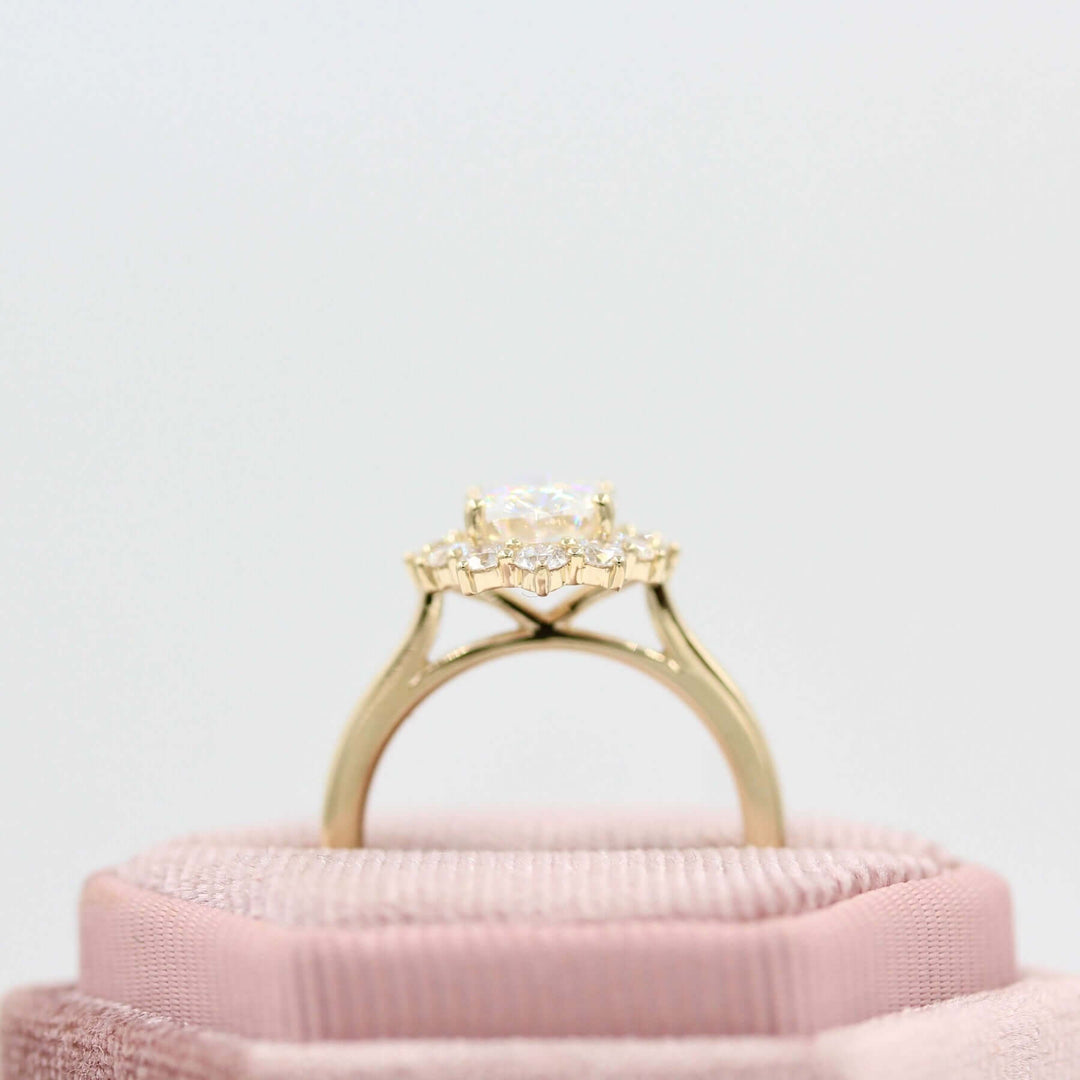 The Allie Ring (Oval) in Yellow Gold in a pink velvet ring box