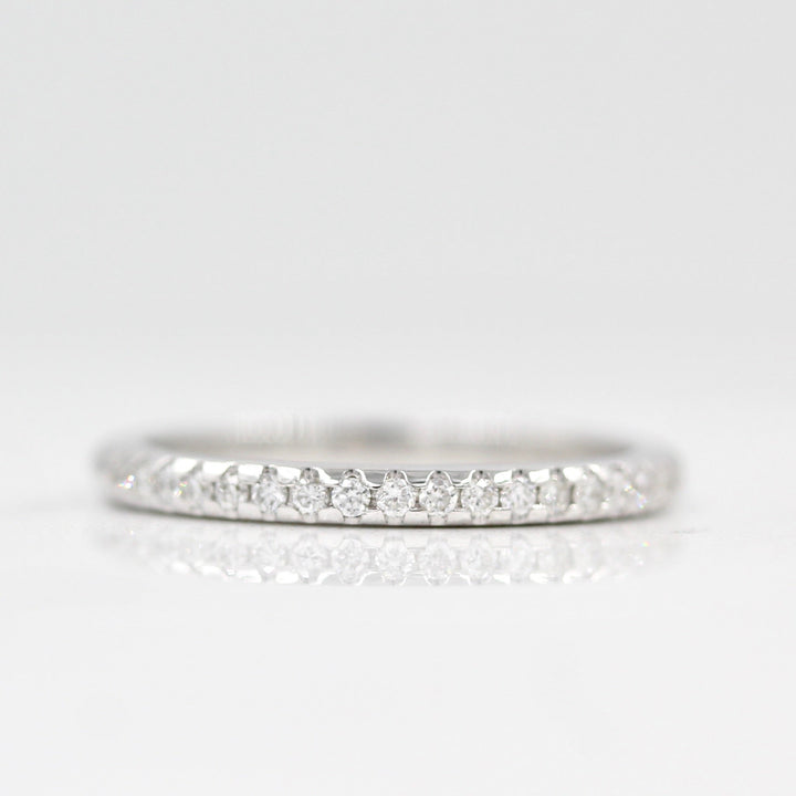 The Lauryn Wedding Band in white gold against a white background