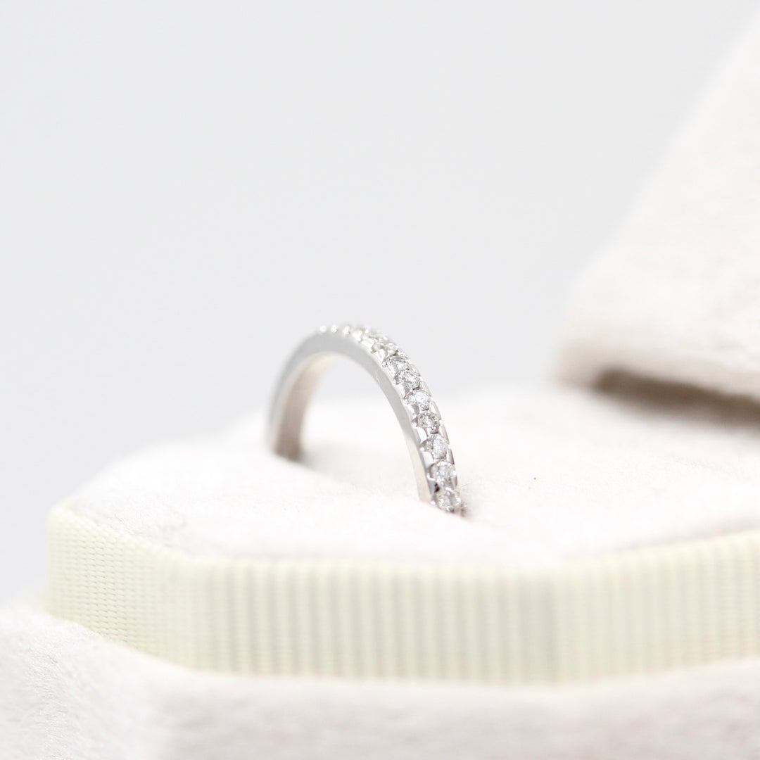 The Lauryn Wedding Band in white gold in a white velvet ring box