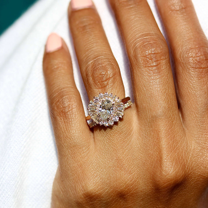 a model wearing a halo engagement ring with a pavé band