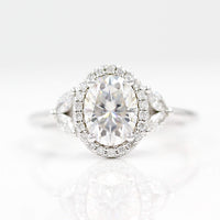 an oval diamond engagement ring.