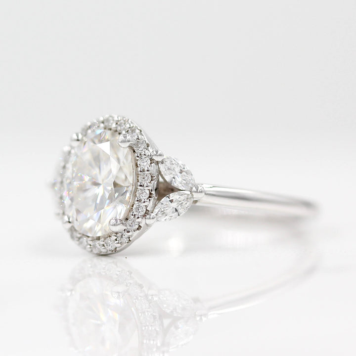 a platinum oval diamond engagement ring.