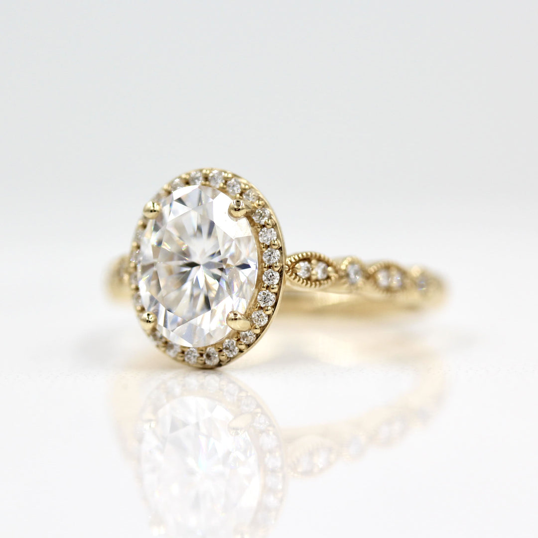 2ct oval halo engagement ring with vintage-inspired details